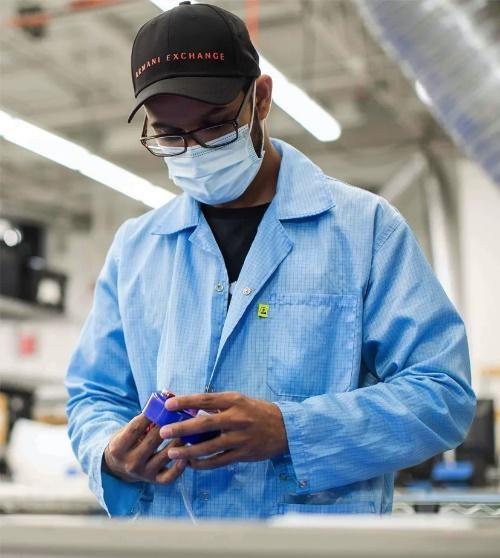 picture of person in blue smock