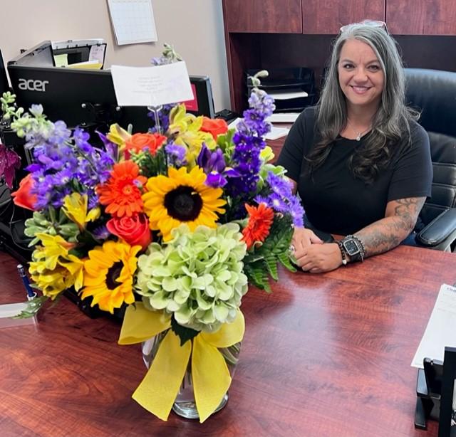 picture of woman and flowers