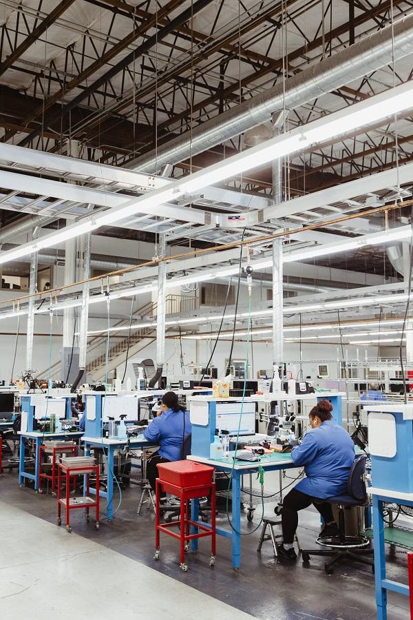 picture of workers on an assembly line