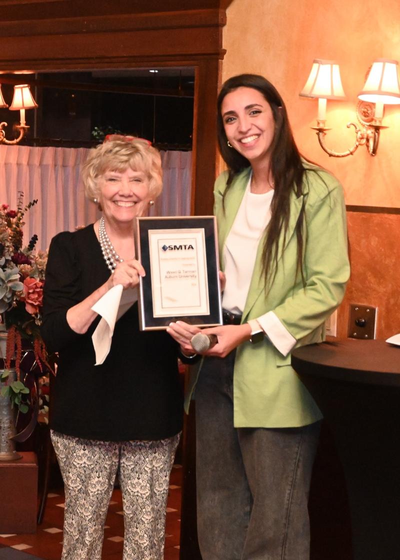 picture of people holding award