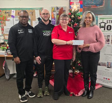 picture of people holding a piece of paper