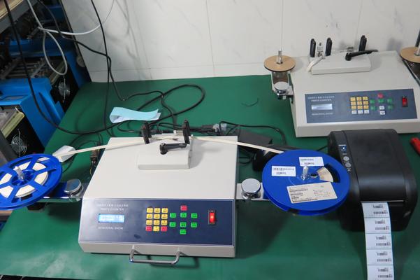 SMD parts counter with bar code scanner and printer